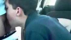 Sucking a cock seated in his car