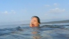 Busty Vamp Aneta Kora Slips Into The Sea For An Aquatic Orgasm