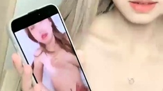 Amateur Asian teen sucks a big cock